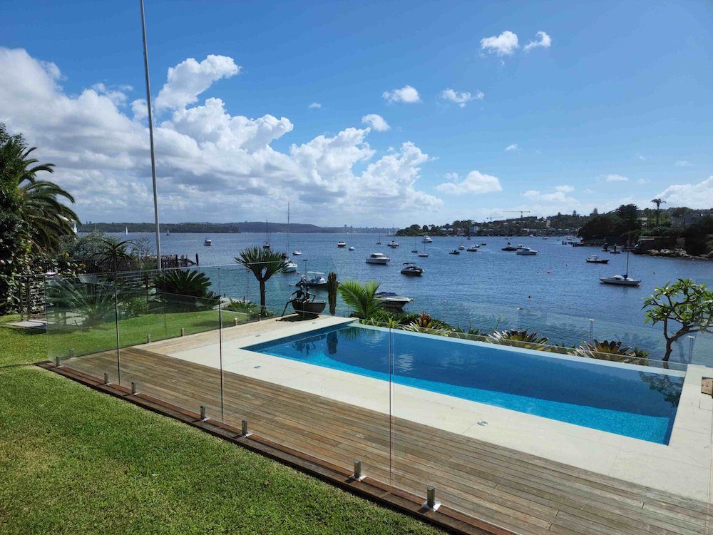 12mm frameless glass pool fencing over looking Parsley Bay
